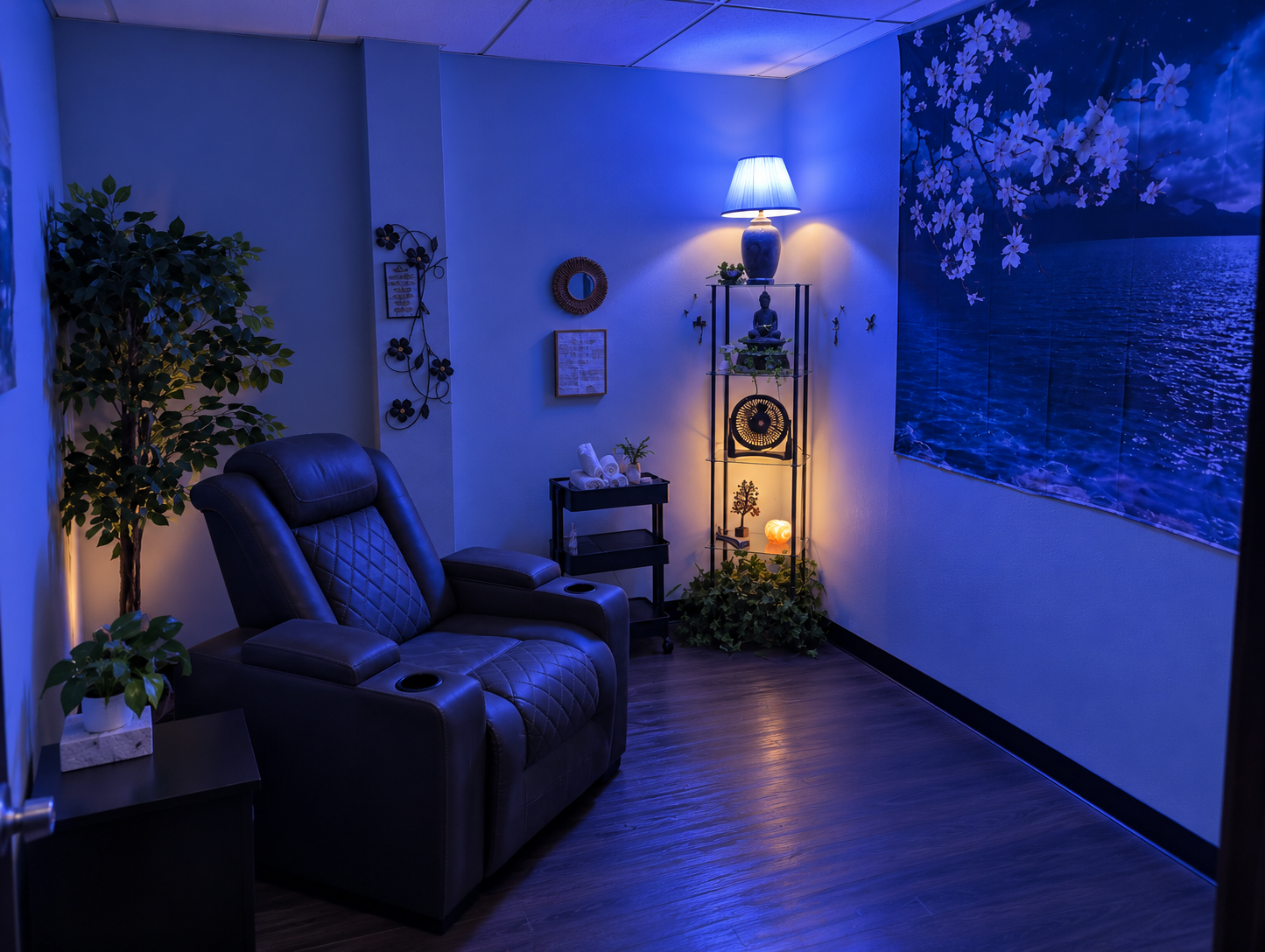 A private Ketamine Colorado Springs treatment room with a reclining infusion chair and calming blue lighting